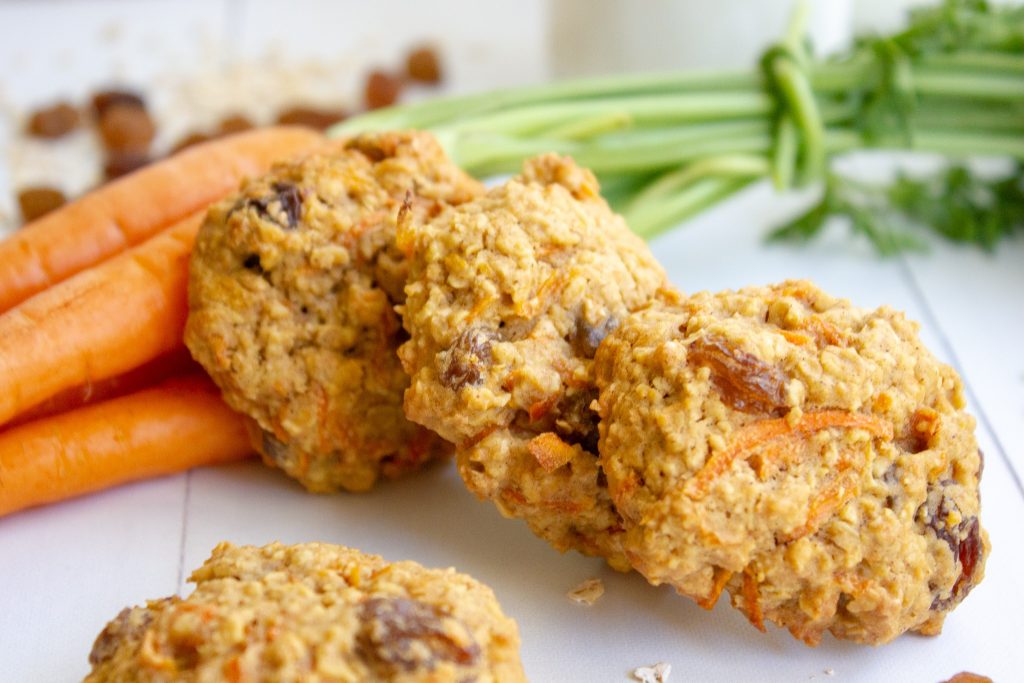 Chewy carrot cake cookies on a plate.
